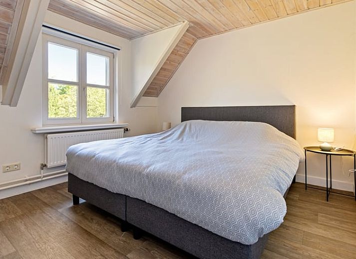 Vakantiehuisje in Deurne, een charmante vakantiewoning in De Peel, Noord Brabant, omringd door natuur en voorzien van een ruim terras.