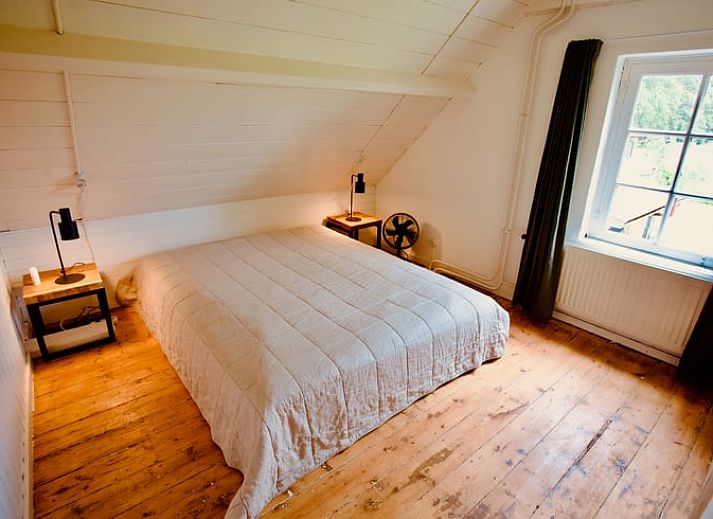 Gezellige buitenruimte van Vakantiehuis in De Rips, ideaal voor ontspanning.