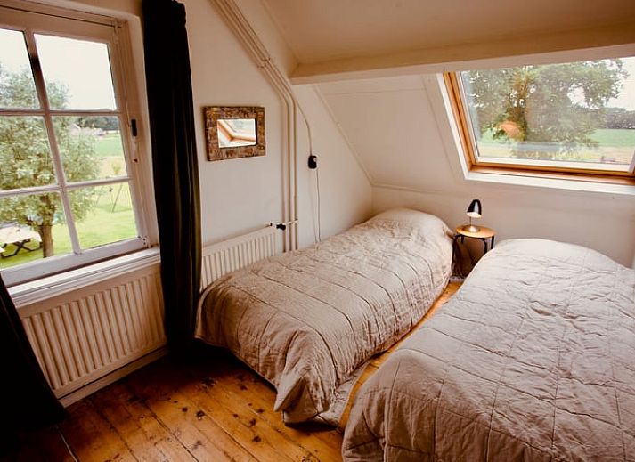 Gezellige buitenruimte van Vakantiehuis in De Rips, ideaal voor ontspanning.