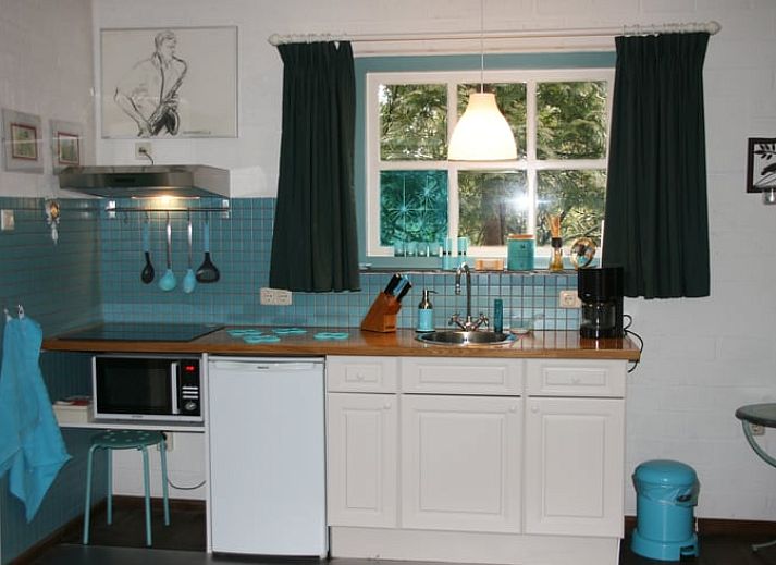 Herfstkleuren omringen Vakantiehuis in Budel, sfeervolle vakantiewoning in Kempen, Noord Brabant.