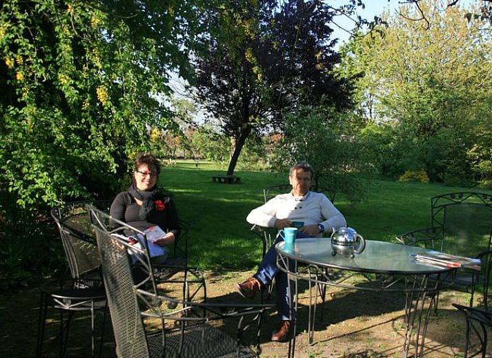 Verlichte nachtelijke aanblik van Vakantiehuis in Budel, ideaal voor een verblijf in Kempen, Noord Brabant.