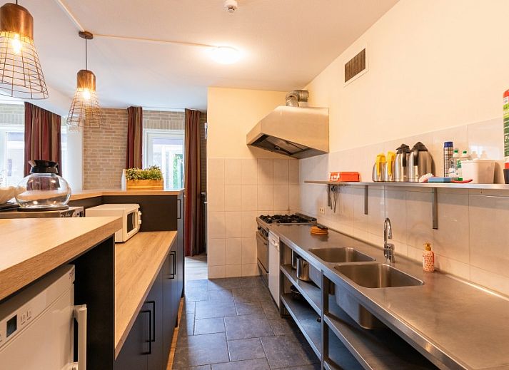 Sonnige Terrasse im Ferienhaus Voorhuis in Hoogeloon, Kempen, Nordbrabant.