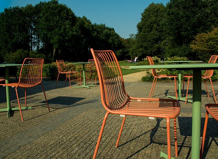 Charmante buitenkant van Vakantiehuis in Baarle-Nassau, omgeven door groene natuur in de Kempen, Noord Brabant.
