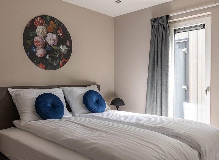 Vakantiehuis Ecovilla Waterzicht Wellness in Oirschot, omgeven door bomen, ideaal voor een ontspannen verblijf in Kempen, Noord Brabant.