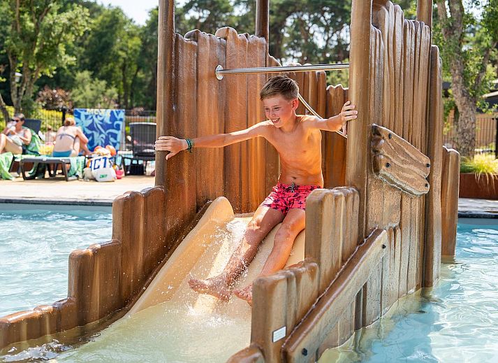 Cozy living room in Watervilla Deluxe, a vacation home for 4 people in Veldhoven, surrounded by the nature of North Brabant.
