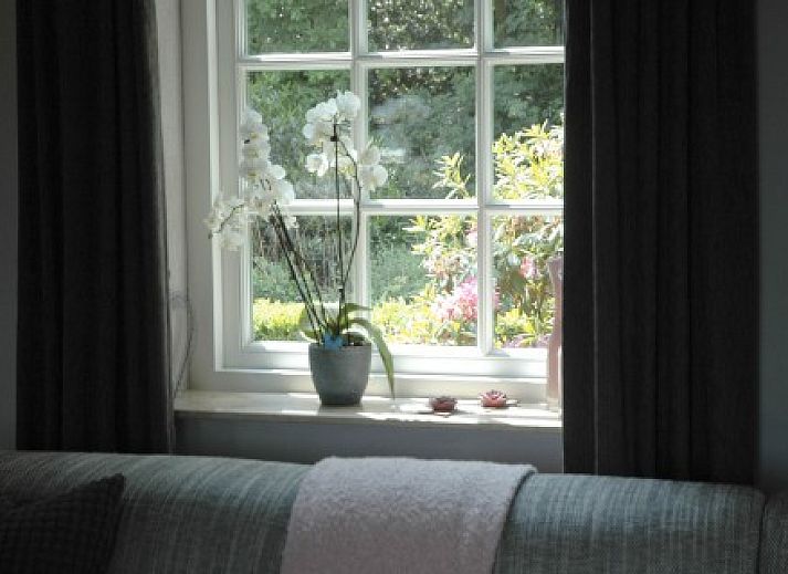 Gezellige woonkamer in De Kipmulder vakantiehuis, Bladel, Kempen. Comfortabele zitruimte met landelijke charme in Noord Brabant.