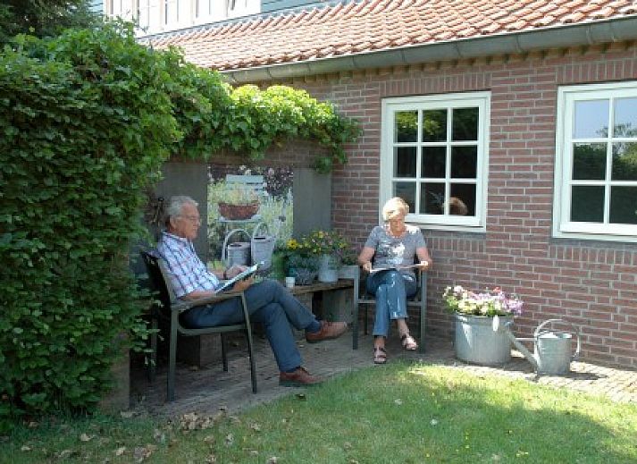 Gezellige woonkamer in De Kipmulder vakantiehuis, Bladel, Kempen. Comfortabele zitruimte met landelijke charme in Noord Brabant.