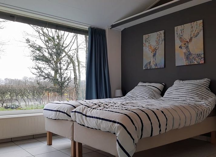 Esszimmer und Kueche im Ferienhaus in Soerendonk, gemuetliche Unterkunft in Nordbrabant.