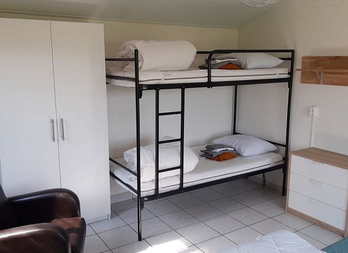 Esszimmer und Kueche im Ferienhaus in Soerendonk, gemuetliche Unterkunft in Nordbrabant.