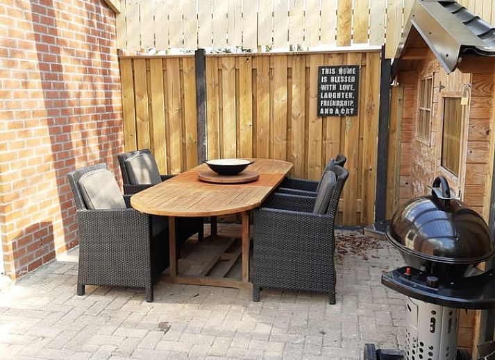 Gemuetliche Sitzecke im Ferienhaus in Soerendonk, ideal zum Entspannen.