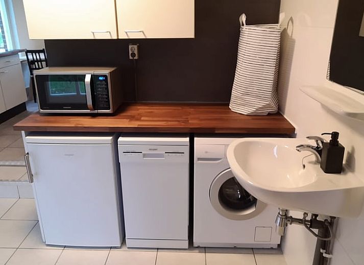 Gemuetliche Sitzecke im Ferienhaus in Soerendonk, ideal zum Entspannen.