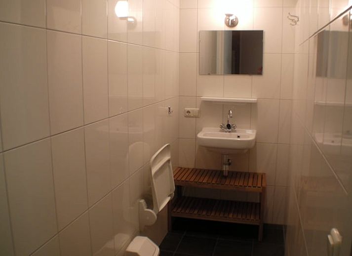 Ruime tuin van vakantiehuis Huisje in Luyksgestel, Noord Brabant.