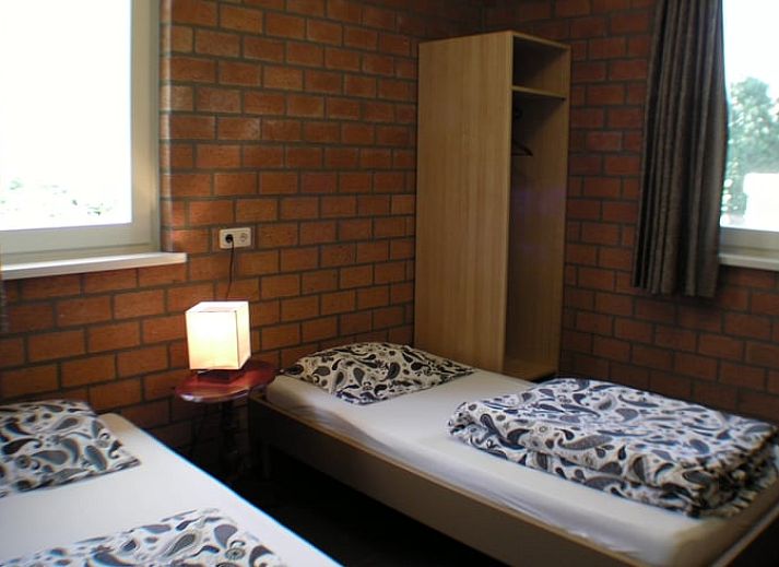 Ruime tuin van vakantiehuis Huisje in Luyksgestel, Noord Brabant.