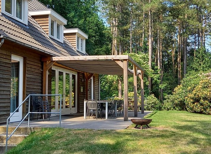 Vakantiehuisje in Luyksgestel omgeven door groene natuur in de Kempen, Noord Brabant.