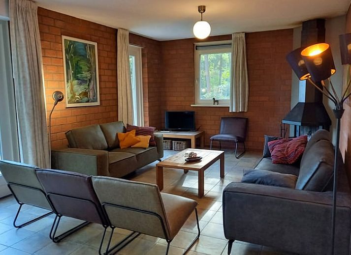 Vakantiehuisje in Luyksgestel verscholen tussen de bomen, ideaal voor een rustige vakantie.