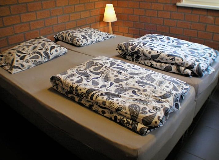 Veranda van Vakantiehuisje in Luyksgestel met uitzicht op de groene omgeving in de Kempen.