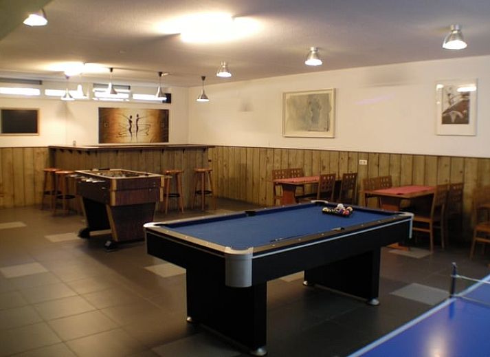 Veranda van Vakantiehuisje in Luyksgestel met uitzicht op de groene omgeving in de Kempen.