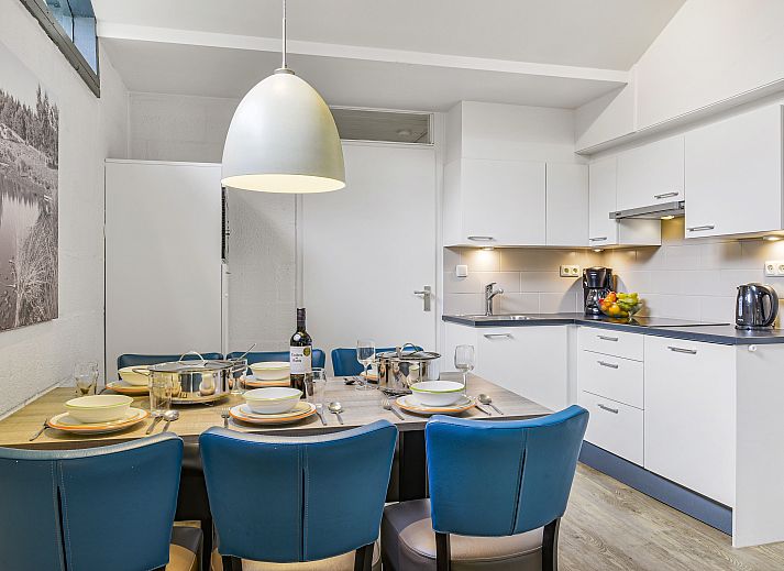 Gezellige woonkamer in Het Vennenbos 6-persoons bungalow 6B1PT, Hapert, Noord Brabant met comfortabele zitruimte en moderne inrichting.