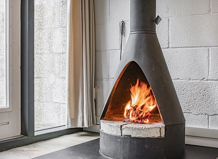 Gezellige woonkamer in Het Vennenbos 6-persoons bungalow 6B1PT, Hapert, Noord Brabant met comfortabele zitruimte en moderne inrichting.