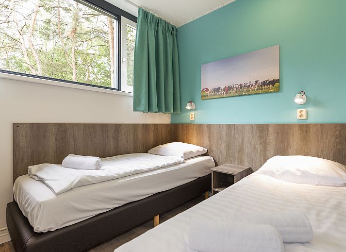 Komfortable Sitzecke mit Treppe im 6-Personen-Bungalow Het Vennenbos, Hapert, Nordbrabant.