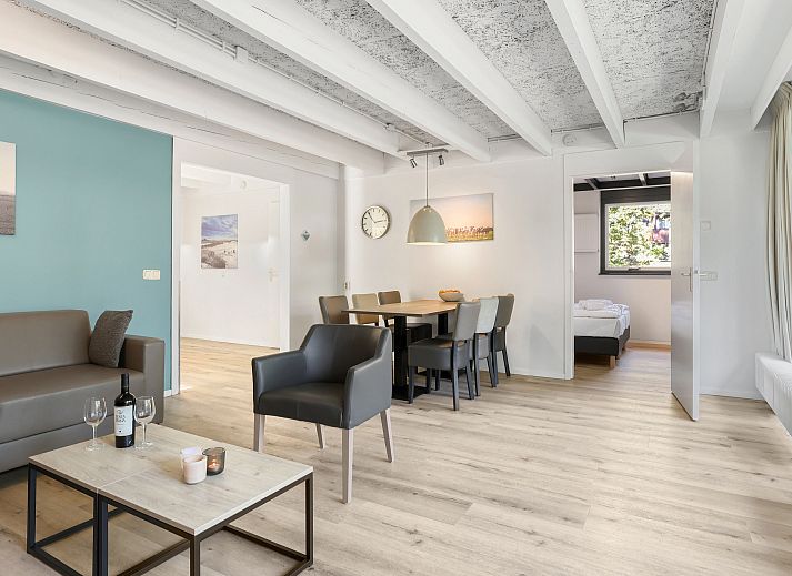 Comfortable sitting area in Het Vennenbos bungalow, ideal for relaxation in Hapert.