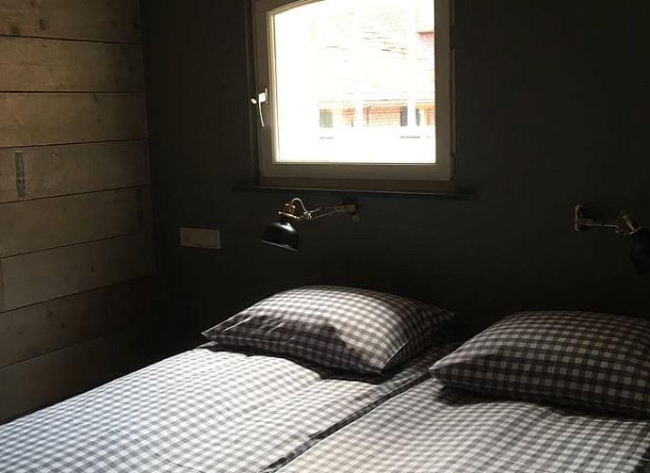 Cozy living room in Holiday home in Oisterwijk, North Brabant, with fireplace and comfortable seating area for a relaxing stay.