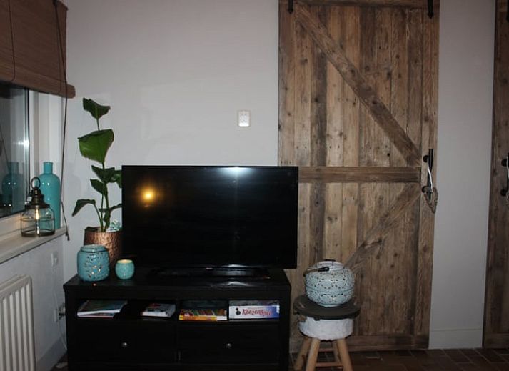 Vakantiehuisje in Oisterwijk met ruim terras en groene omgeving, perfect voor een verblijf in Hart van Brabant.