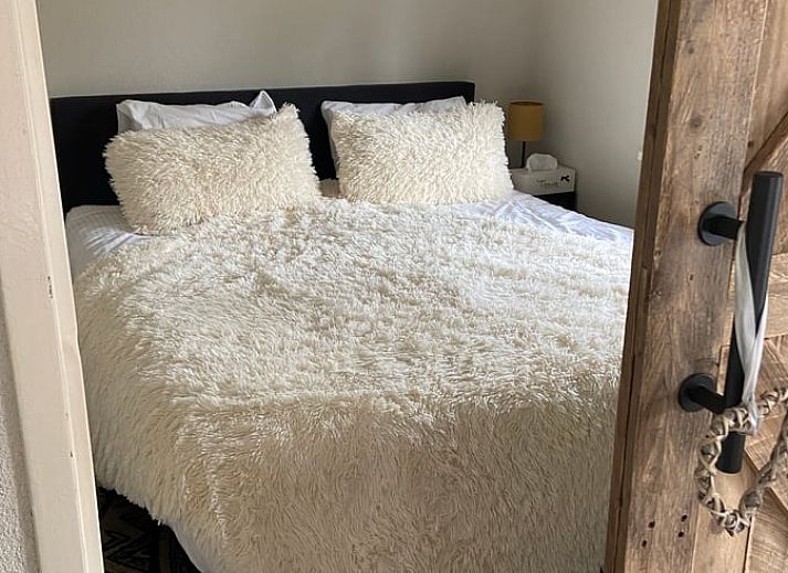 Charmant terras bij Vakantiehuisje in Oisterwijk, omringd door natuur in Hart van Brabant, Noord Brabant.