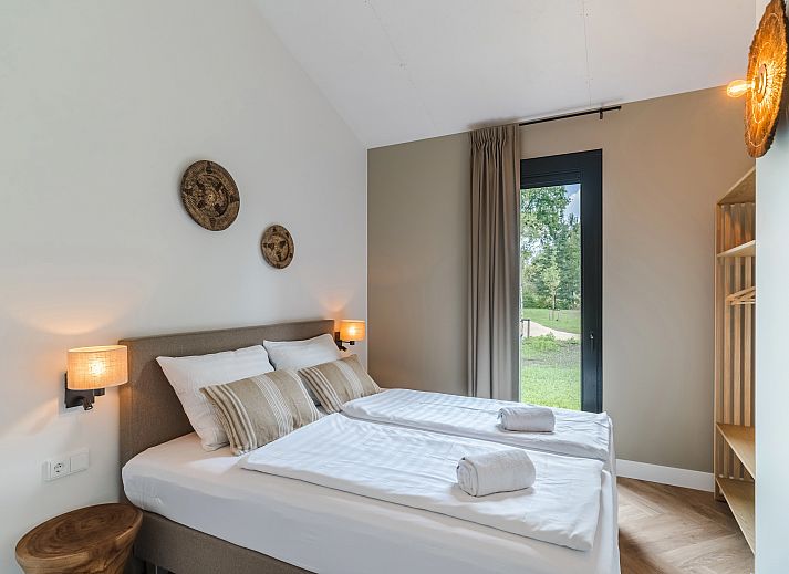 Geniessen Sie die moderne 6-Personen-Lodge 6BE in Oisterwijk, Hart van Brabant, mit grosser Terrasse und komfortablem Aussenbereich.