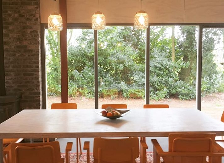 Exterior of Cottage in Liempde, North Brabant surrounded by lush nature.