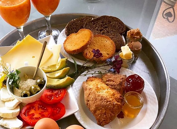 Sunny terrace at Holiday home in Liempde, ideal for outdoor dining in Heart of Brabant.