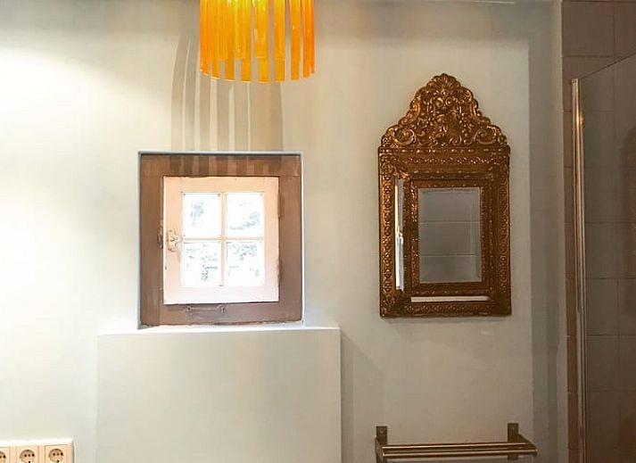 Stylish interior of Holiday Home in Liempde with colorful decorations and spacious dining area.