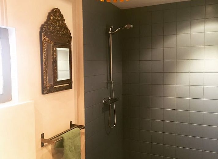 Stylish interior of Holiday Home in Liempde with colorful decorations and spacious dining area.