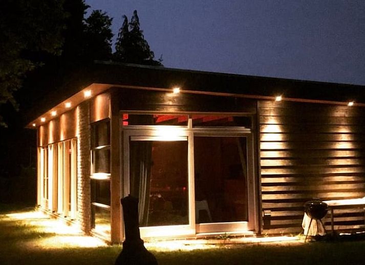 Stylish interior of Holiday Home in Liempde with colorful decorations and spacious dining area.