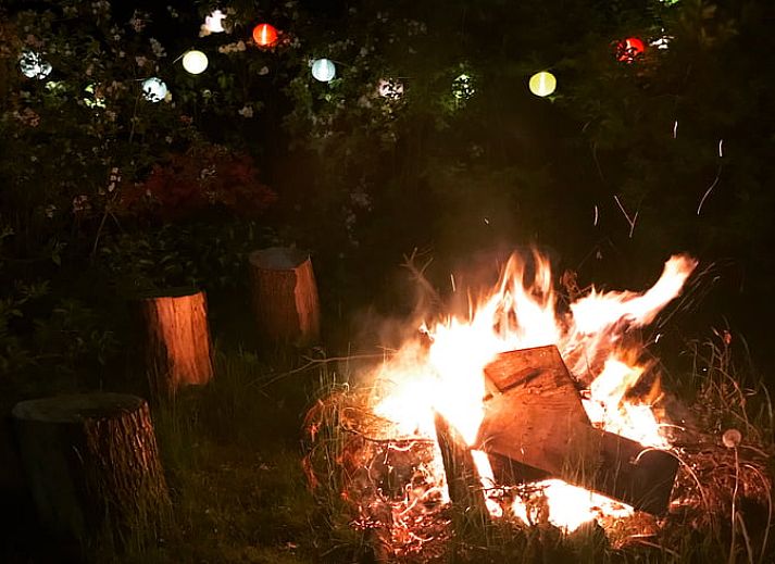 Modern kitchen in Holiday home in Liempde with wooden finish and spacious dining table.