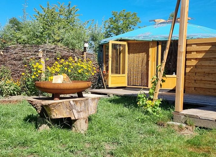 Cozy interior of Holiday Home in Liempde, North Brabant with natural light and wooden interior.