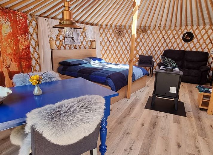 Exterior view of Holiday home in Liempde, Heart of Brabant with colorful flowers and green surroundings.