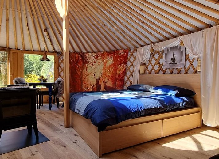 Exterior view of Holiday home in Liempde, Heart of Brabant with colorful flowers and green surroundings.