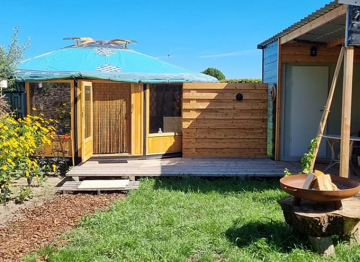 Beautiful garden surrounding Holiday home in Liempde, North Brabant with various flowers and plants.