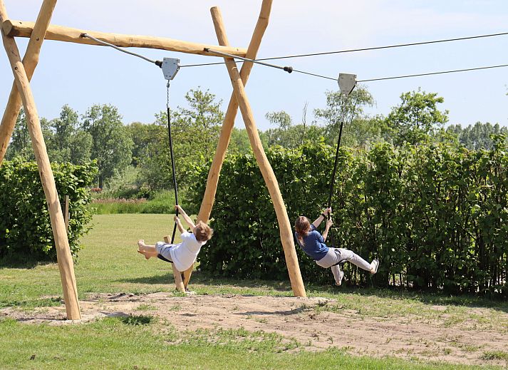 Gemuetliches Schlafzimmer im Ferienhaus Duinhoeve, Udenhout, fuer einen entspannten Urlaub in Hart van Brabant.