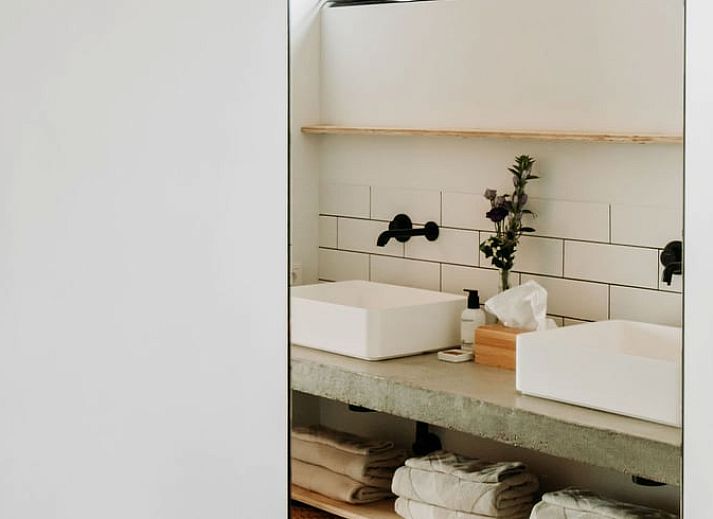 Relaxing garden with deck chairs at Holiday home in Chaam, surrounded by nature in North Brabant.