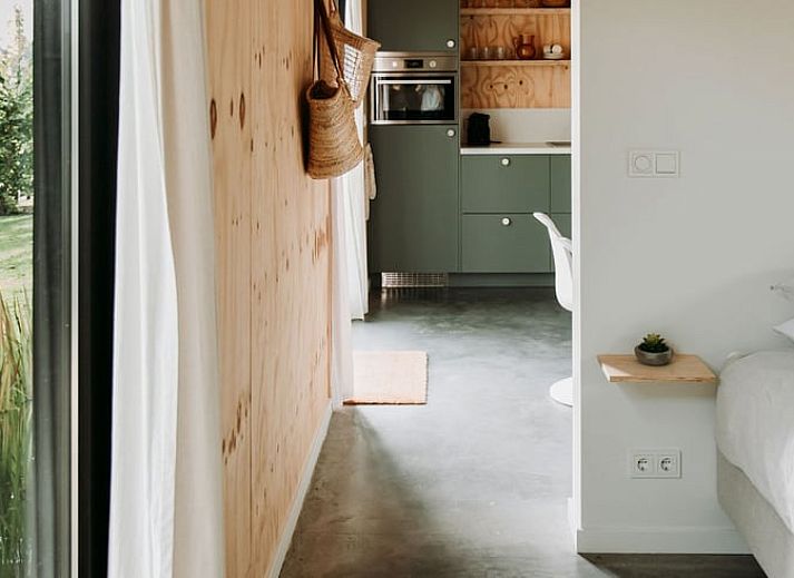 Relaxing garden with deck chairs at Holiday home in Chaam, surrounded by nature in North Brabant.