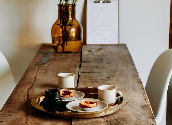 Rustic garden at Holiday home in Chaam, Heart of Brabant with shady spot and landscape views.