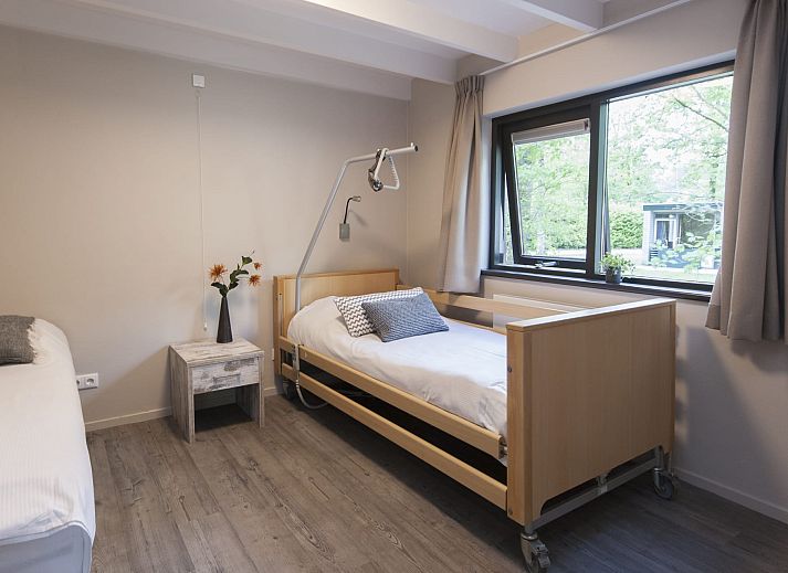 Gemuetliche Sitzecke mit Kamin im Custom Sommerhus Malmoe, Chaam, Brabant.