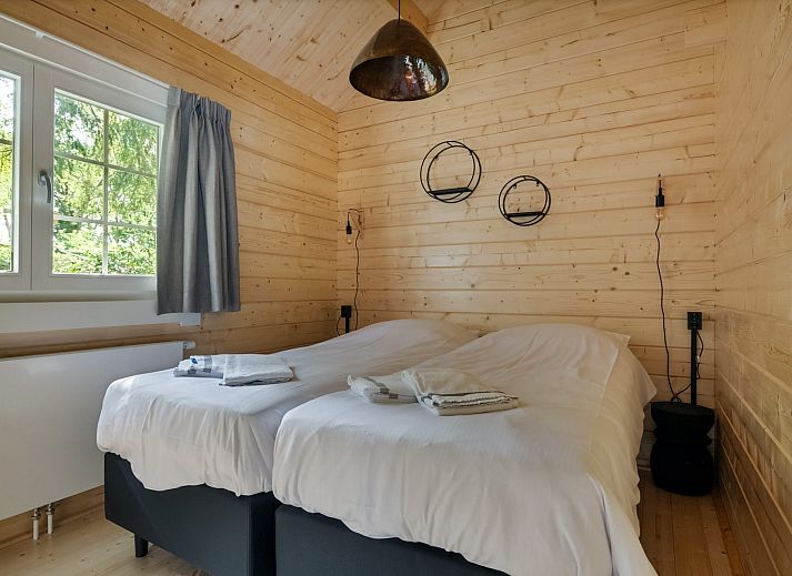 Veranda der Finnischen Lodge Plus in Chaam, im Herzen von Brabant. Geniessen Sie die Ruhe und die Natur in diesem komfortablen Ferienhaus in Nordbrabant.