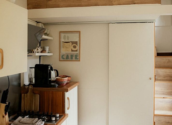 Entree van het Vakantiehuis in Diessen, Hart van Brabant, met open deuren naar het terras.