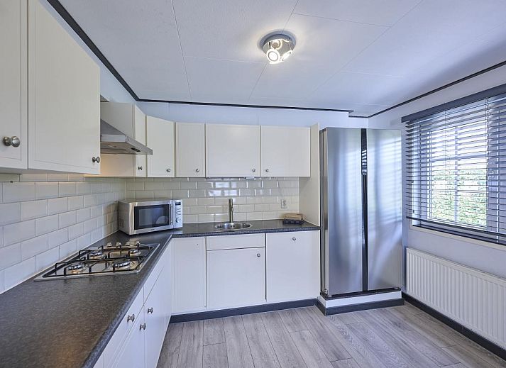 Terras van 't Kaatsheuveltje 1 vakantiehuis in Kaatsheuvel, Hart van Brabant, Noord Brabant met jacuzzi en tuinmeubelen