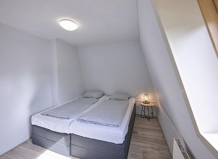 Gezellige woonkamer van 't Kaatsheuveltje 1 vakantiehuis in Kaatsheuvel, Hart van Brabant, Noord Brabant met comfortabele zithoek