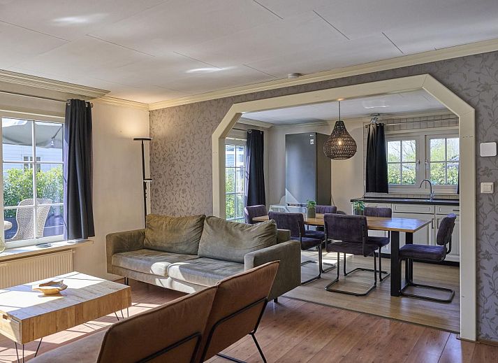 Geniessen Sie die Sonne auf der Terrasse von 't Kaatsheuveltje 2, einem Ferienhaus in Kaatsheuvel, Hart van Brabant, Nordbrabant.