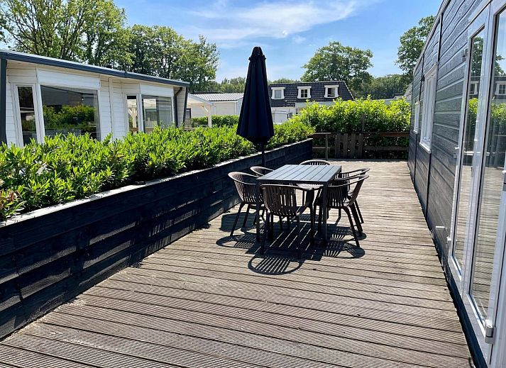 Entspannen Sie sich im Jacuzzi im Kaatsheuveltje 6, Ferienhaus in Kaatsheuvel, Hart van Brabant, Nordbrabant.